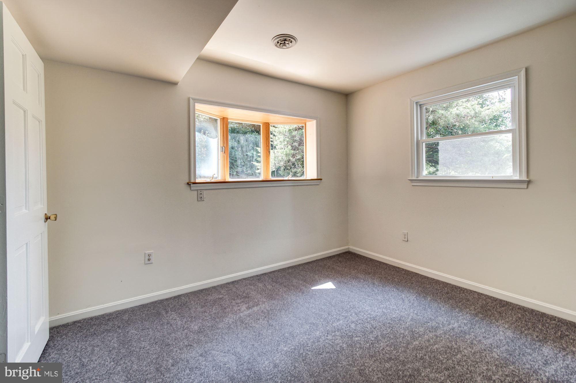471 Fairhaven Road Tracys Landing, MD 20779 - Photo 23 of 40 an empty room with windows