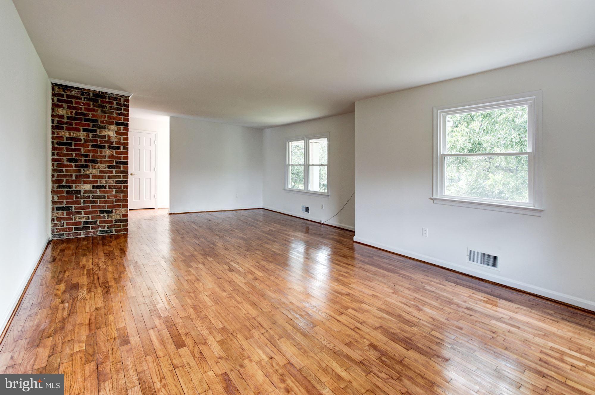 471 Fairhaven Road Tracys Landing, MD 20779 - Photo 4 of 40 wooden floor in an empty room with a window