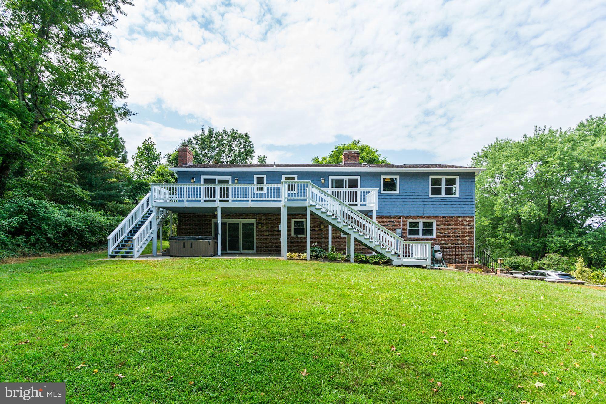 471 Fairhaven Road Tracys Landing, MD 20779 - Photo 31 of 40 a view of a house with a yard and sitting area