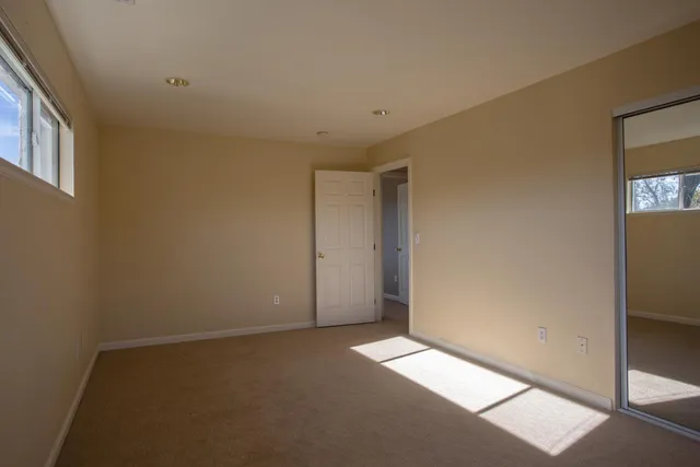 an empty room with windows