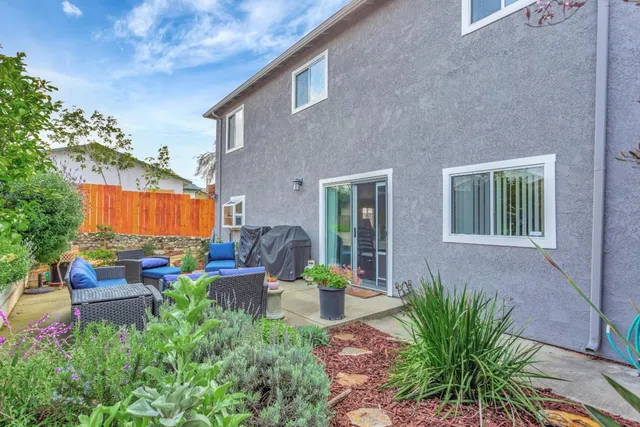 a front view of a house with patio