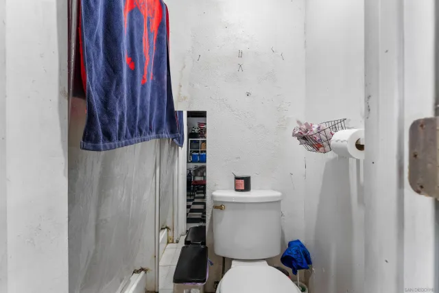 a outdoor space with lots of furniture and a flat screen tv