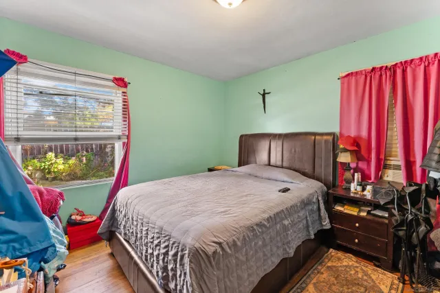 a bathroom with a sink mirror and vanity