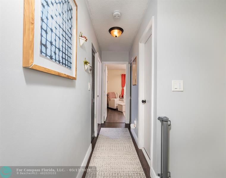 11285 Sunview Way Hollywood, FL 33026 - Photo 17 of 33 a view of a hallway with closet