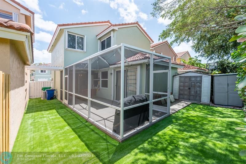 11285 Sunview Way Hollywood, FL 33026 - Photo 21 of 33 a view of backyard with deck and garden