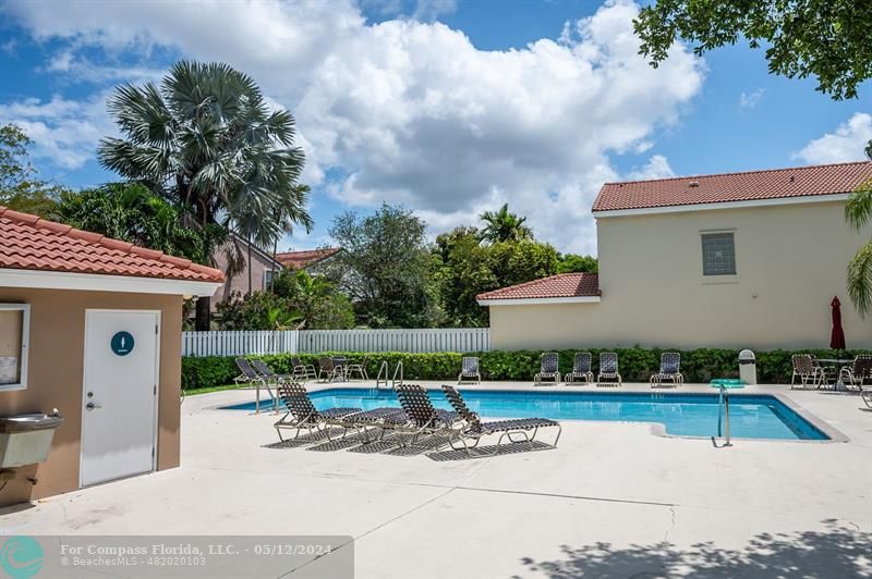 11285 Sunview Way Hollywood, FL 33026 - Photo 31 of 33 a view of backyard with swimming pool and furniture