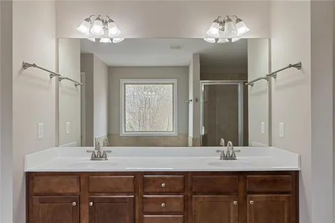 a white bath tub sitting next to a window