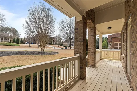 a view of a patio with a yard
