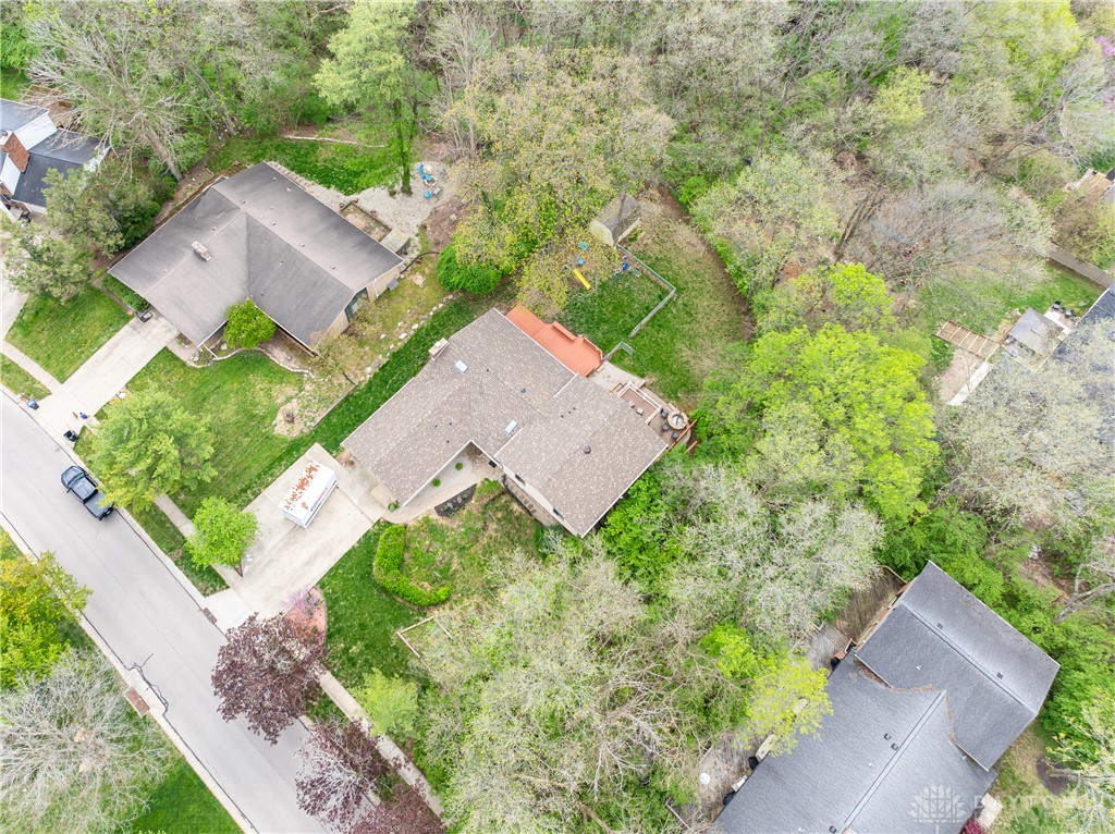728 Chipplegate Drive Centerville, OH 45459 - Photo 26 of 30 An aerial view captures a home nestled among lush trees, offering tranquil suburban living.