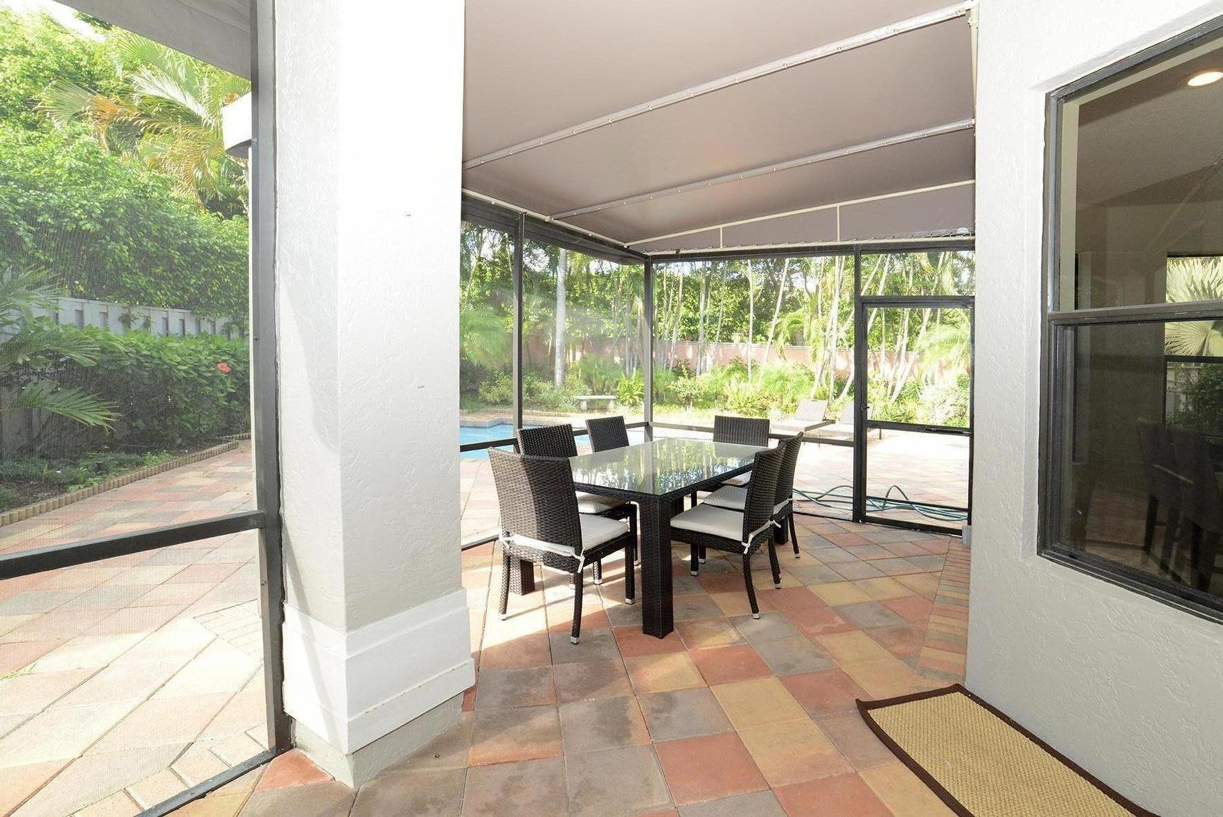 2453 Northwest 64th Street Boca Raton, FL 33496 - Photo 17 of 19 Covered Patio