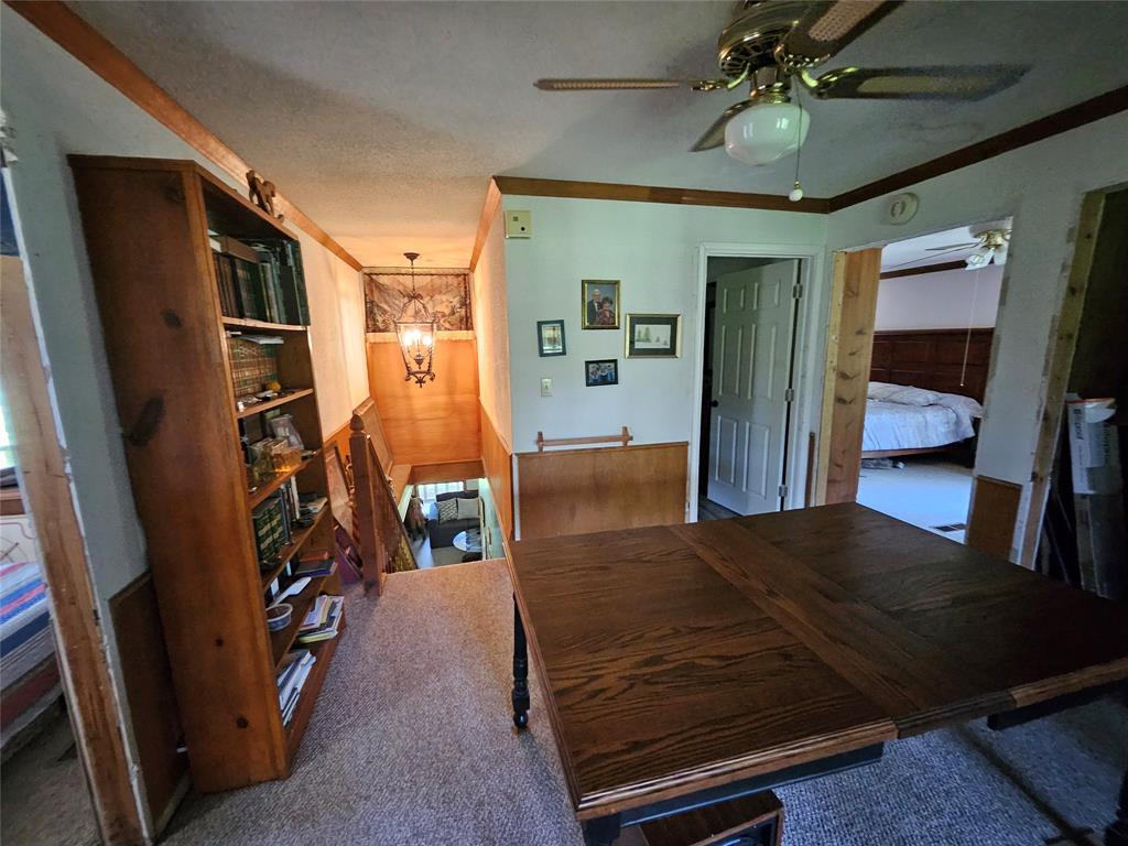16307 County Road Henderson, TX 75654 - Photo 11 of 27 a living room with furniture and a flat screen tv