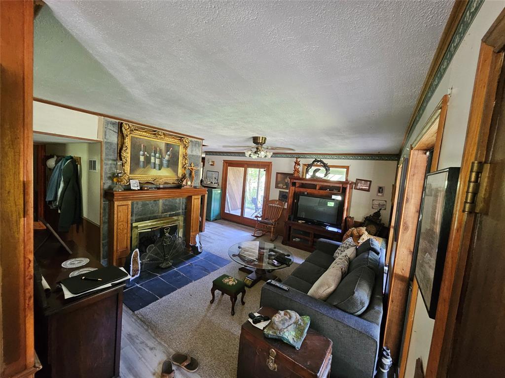 16307 County Road Henderson, TX 75654 - Photo 5 of 27 a view of a room with gym equipment
