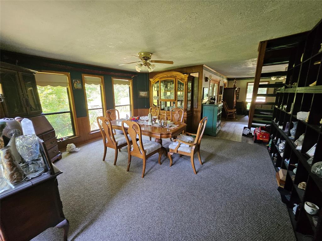 16307 County Road Henderson, TX 75654 - Photo 8 of 27 a view of a livingroom with furniture and windows