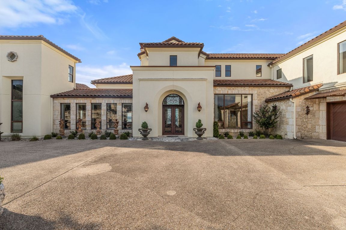 12600 Lyndon Drive Austin, TX 78732 - Photo 2 of 37 a view of a house with a outdoor space