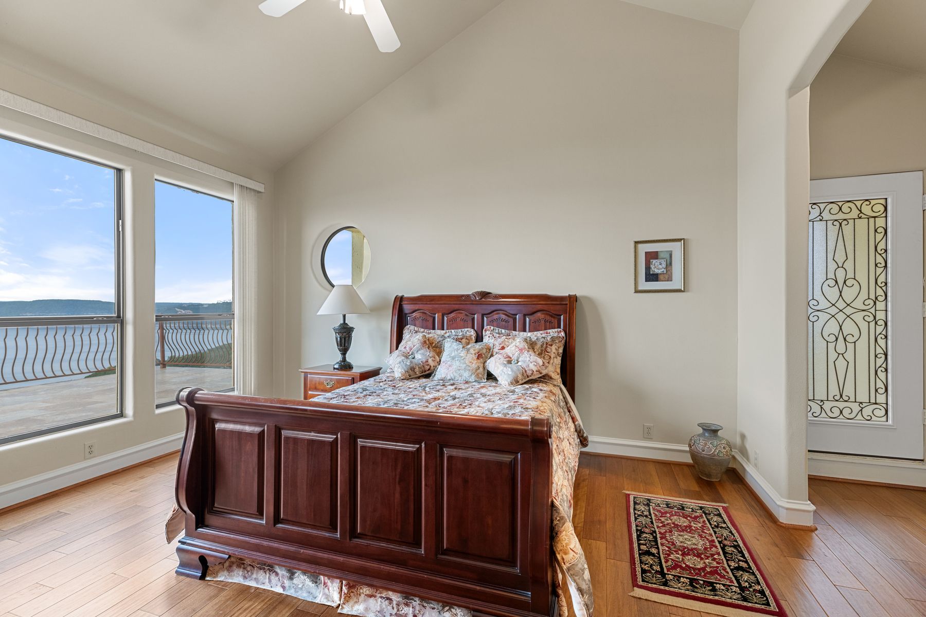 12600 Lyndon Drive Austin, TX 78732 - Photo 22 of 37 a bedroom with a bed and a window