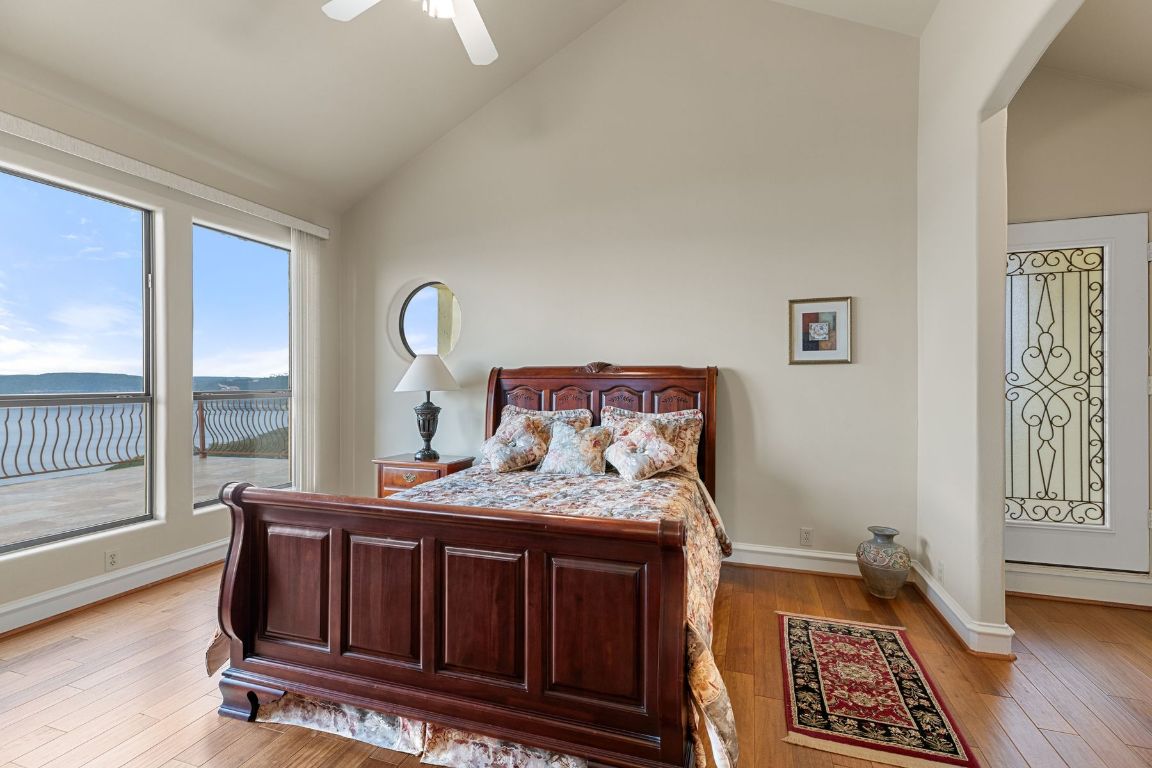 12600 Lyndon Drive Austin, TX 78732 - Photo 22 of 37 a bedroom with a bed and a window