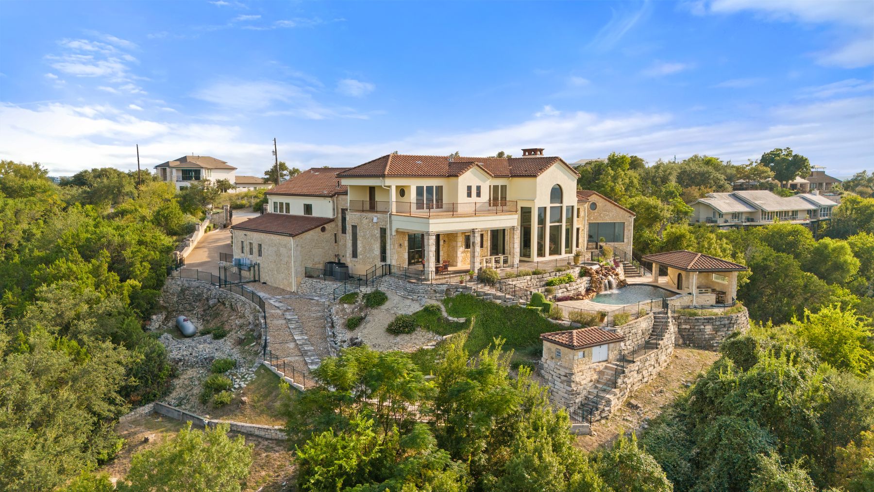 12600 Lyndon Drive Austin, TX 78732 - Photo 26 of 37 a view of a lake with a city