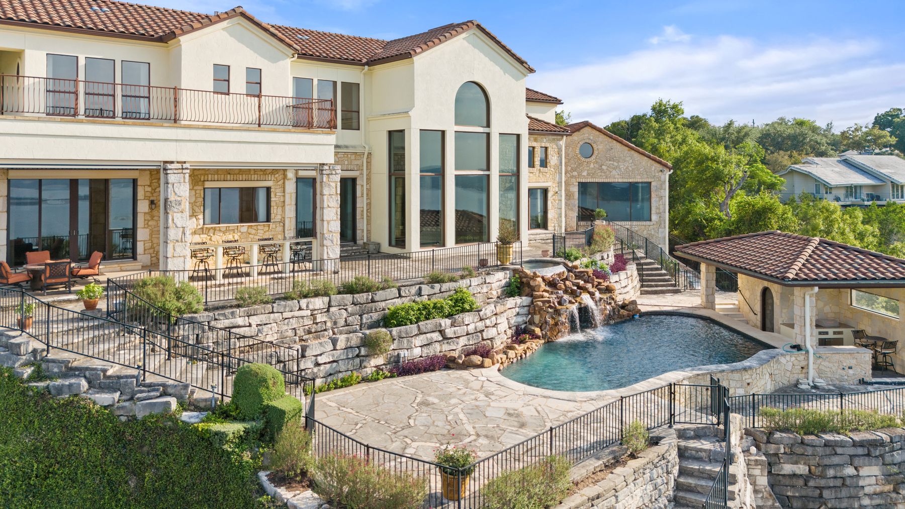 12600 Lyndon Drive Austin, TX 78732 - Photo 27 of 37 a view of house with yard outdoor seating area and barbeque oven