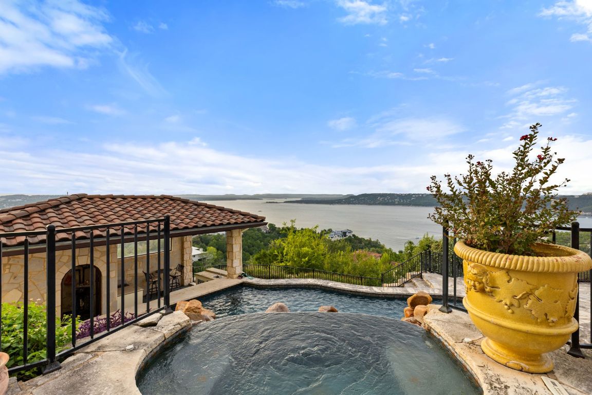 12600 Lyndon Drive Austin, TX 78732 - Photo 28 of 37 a view of a terrace with a garden