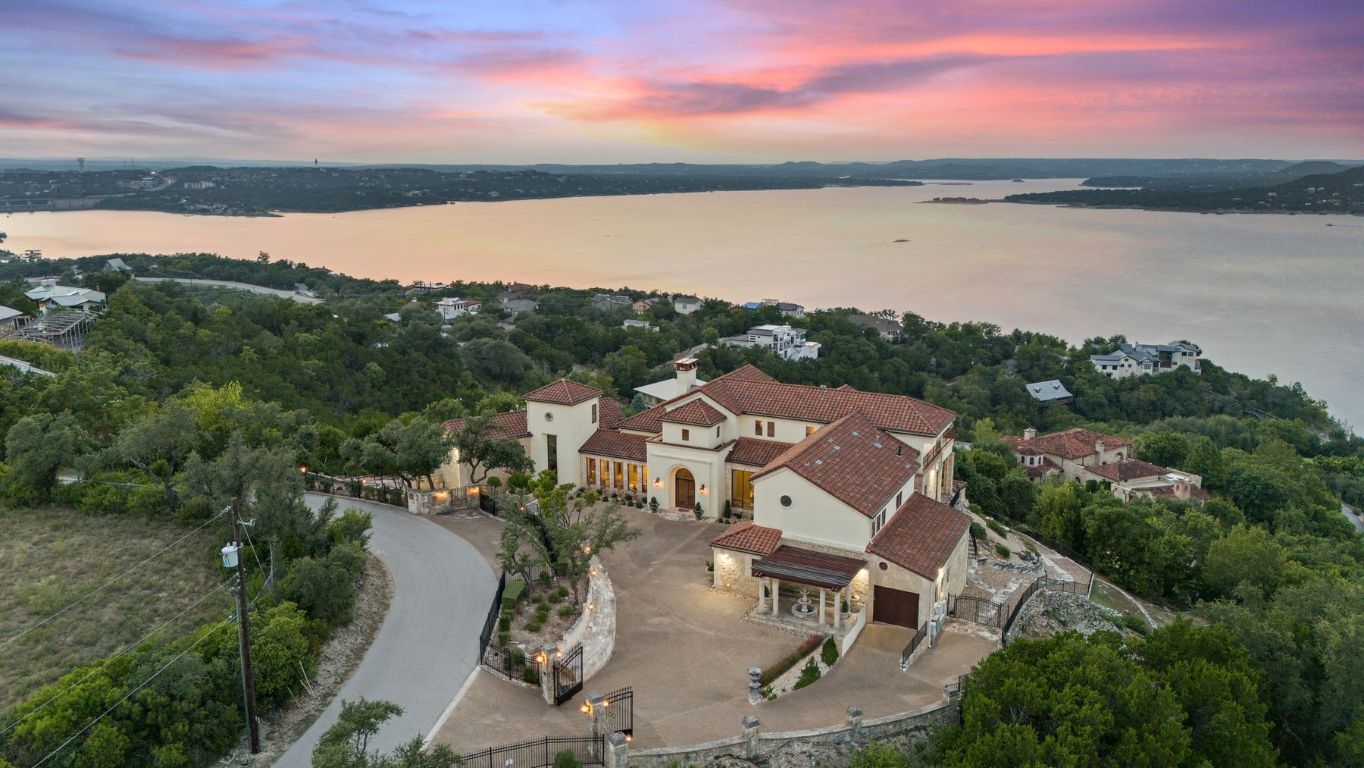 12600 Lyndon Drive Austin, TX 78732 - Photo 34 of 37 a view of a lake with a city