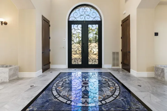 a view of entryway with a front door