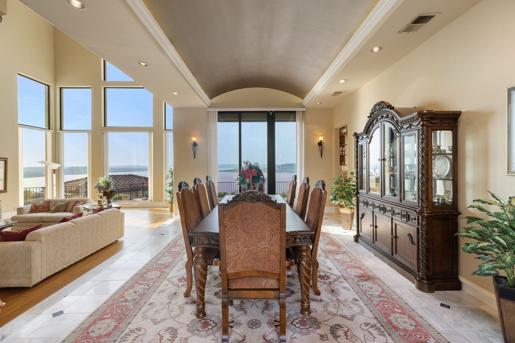 12600 Lyndon Drive Austin, TX 78732 - Photo 6 of 37 a view of a dining room with furniture window and wooden floor