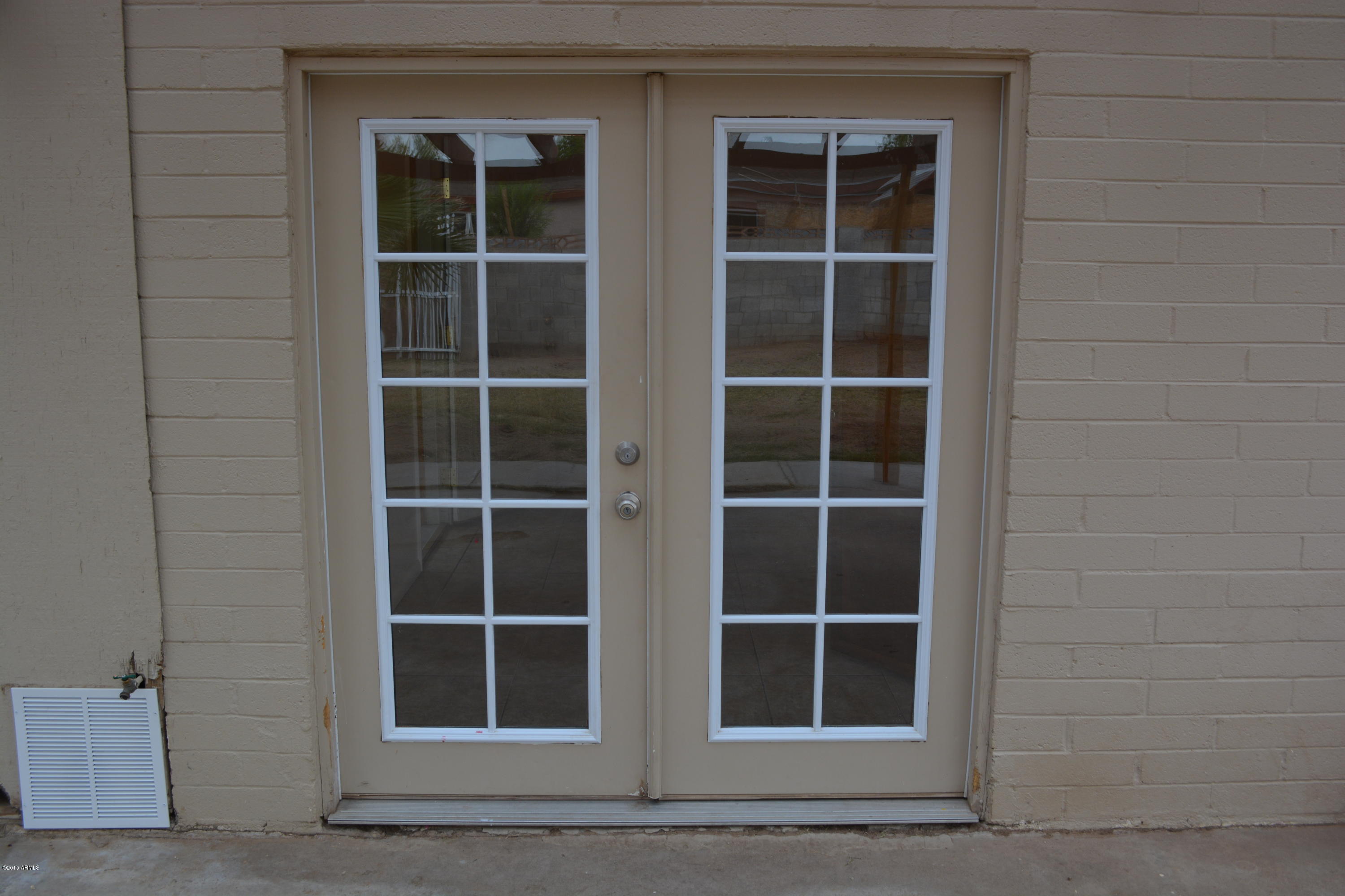 1737 West Vineyard Road Phoenix, AZ 85041 - Photo 6 of 24 Rear french doors