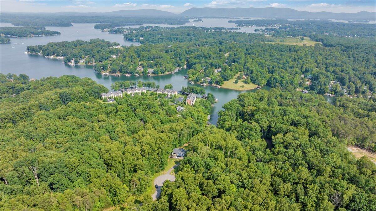 Lot 1 Windlass Road Moneta, VA 24121 - Photo 25 of 55 a view of a lake with a building in the background