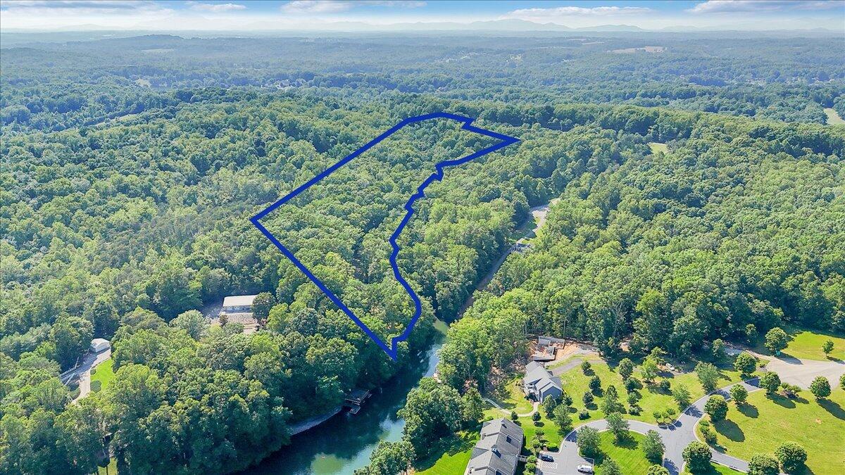 Lot 1 Windlass Road Moneta, VA 24121 - Photo 55 of 55 an aerial view of a house with a yard and lake view