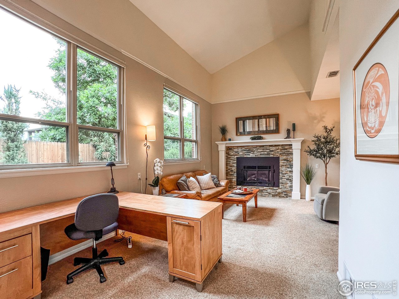 645 Cree Circle Boulder, CO 80303 - Photo 12 of 40 a living room with furniture and a fireplace