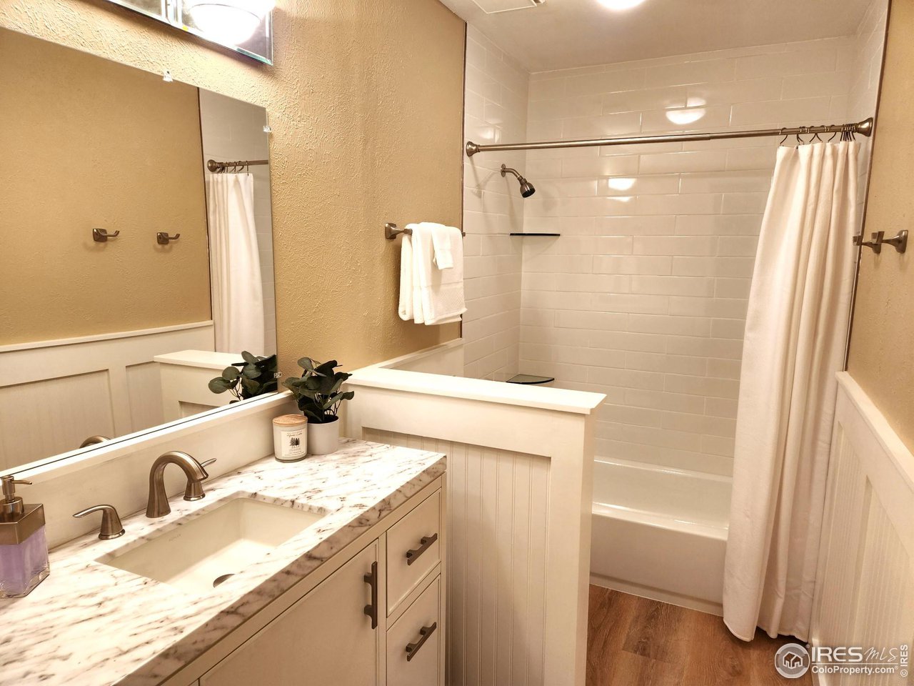 645 Cree Circle Boulder, CO 80303 - Photo 23 of 40 a bathroom with a sink and a mirror