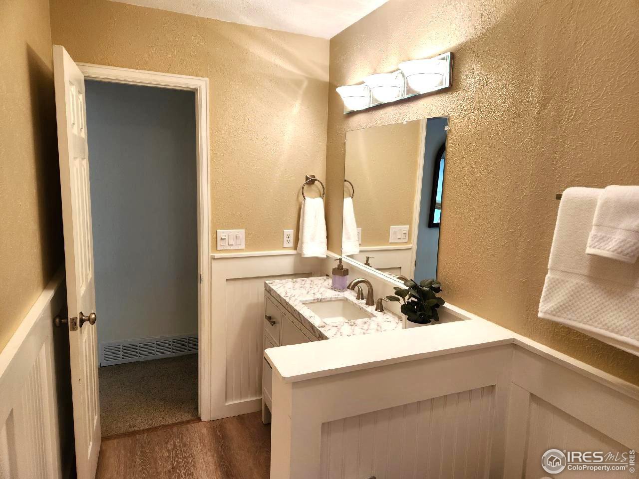 645 Cree Circle Boulder, CO 80303 - Photo 24 of 40 a bathroom with a sink and a mirror