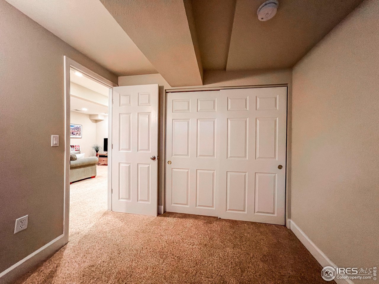 645 Cree Circle Boulder, CO 80303 - Photo 29 of 40 a view of a livingroom with wooden floor and a bathroom