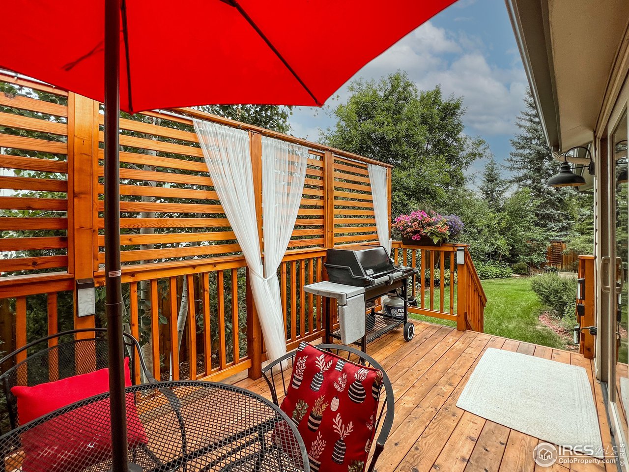 645 Cree Circle Boulder, CO 80303 - Photo 32 of 40 a view of balcony with two chairs and a table
