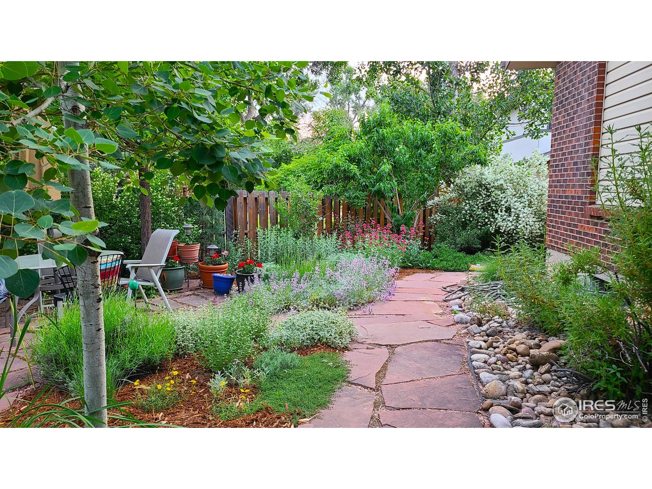 645 Cree Circle Boulder, CO 80303 - Photo 38 of 40 a black and white photo of a garden