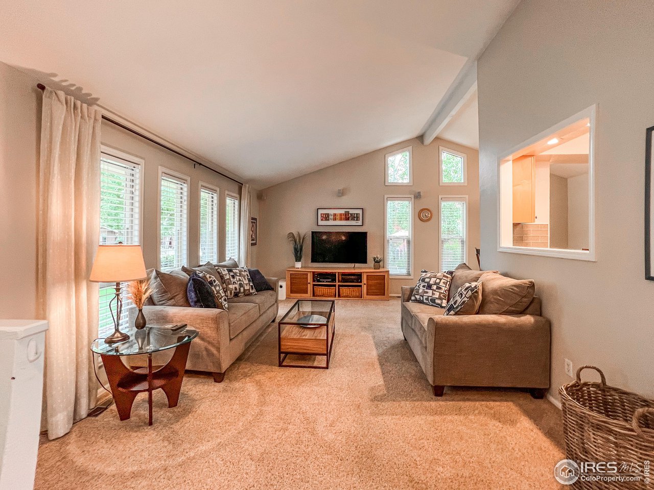 645 Cree Circle Boulder, CO 80303 - Photo 4 of 40 a living room with furniture and a flat screen tv