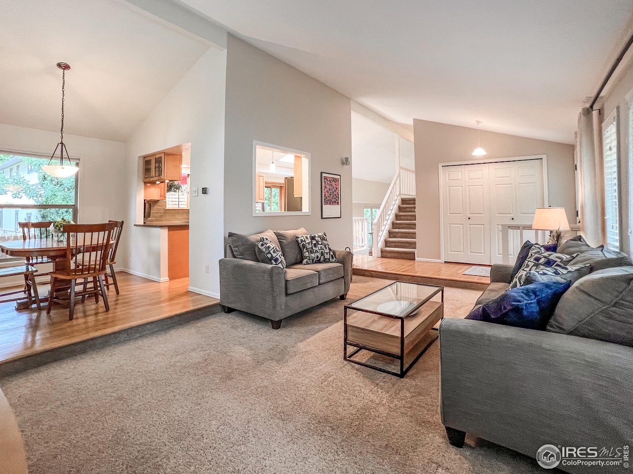 645 Cree Circle Boulder, CO 80303 - Photo 6 of 40 a living room with furniture and a large window