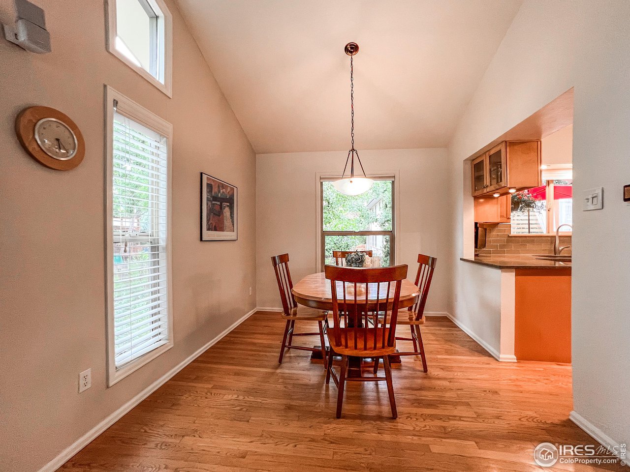 645 Cree Circle Boulder, CO 80303 - Photo 7 of 40 a view of a dining room with furniture window and wooden floor