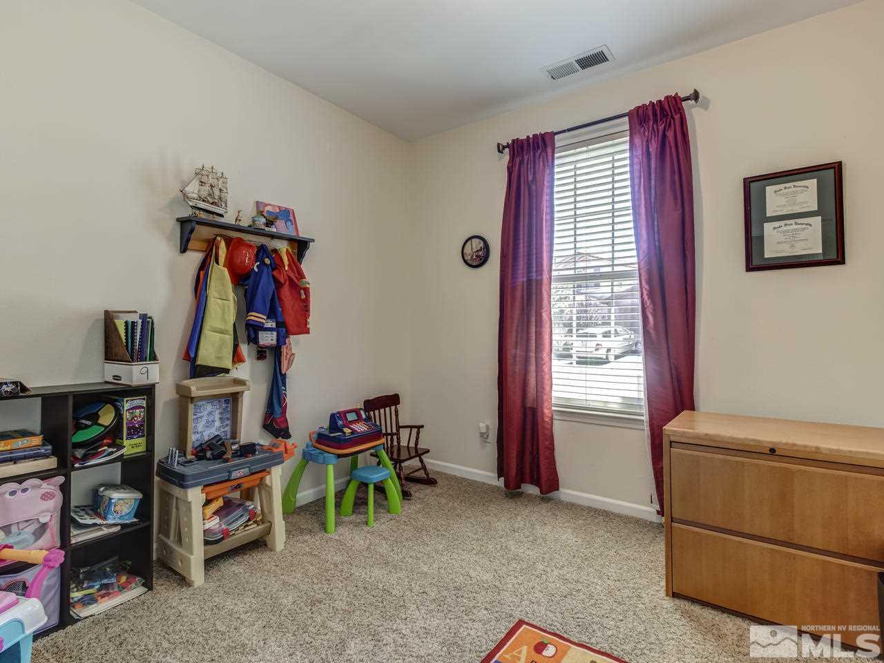 417 Alysheba Court Reno, NV 89521 - Photo 19 of 25 a view of livingroom with furniture and a window