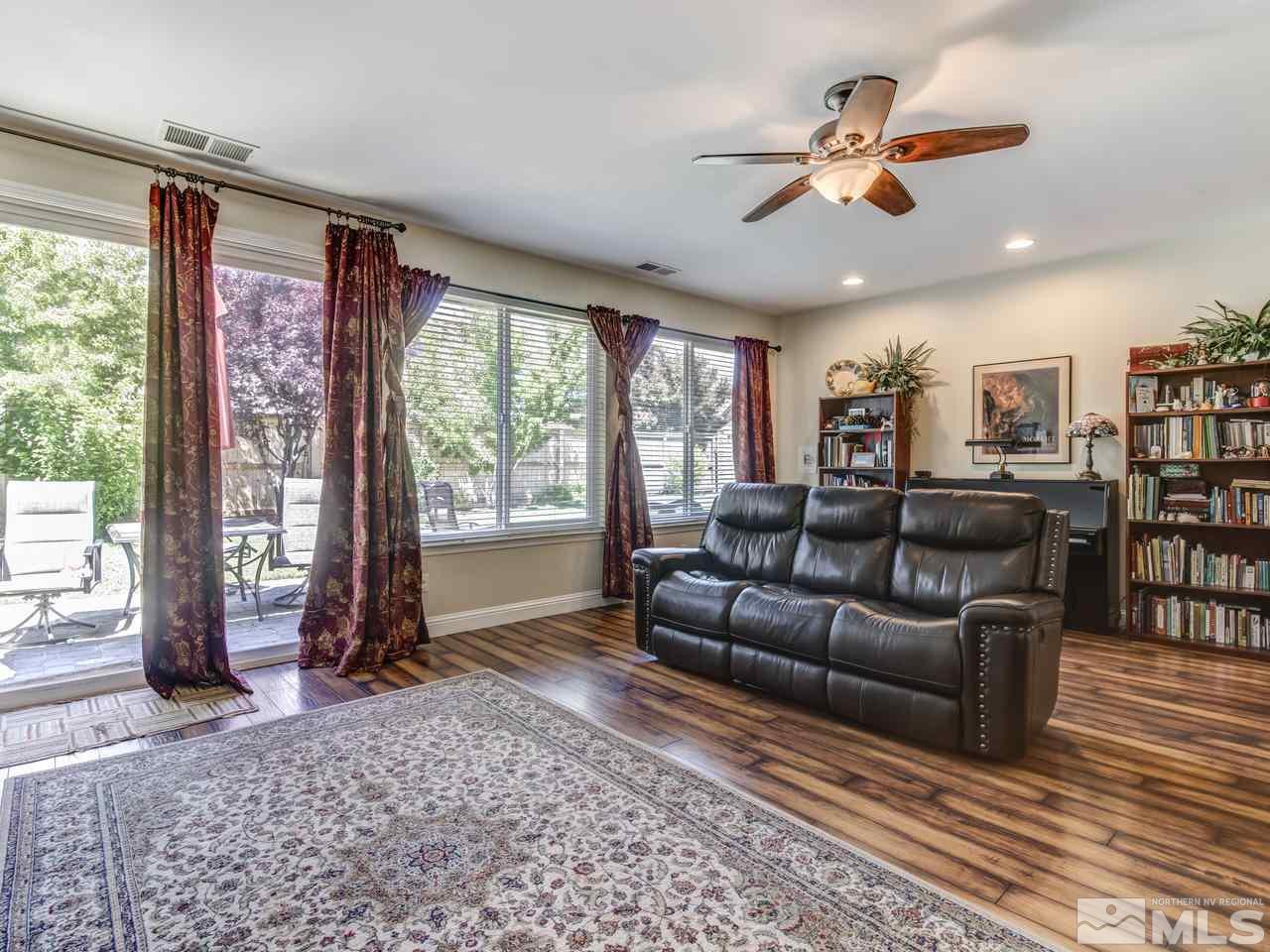 417 Alysheba Court Reno, NV 89521 - Photo 4 of 25 a living room with furniture and a large window