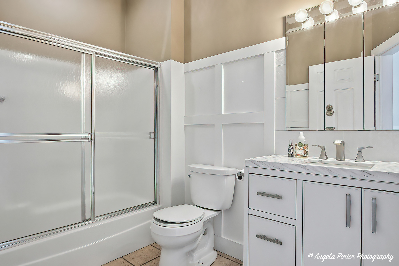 35166 Lake Shore Road Ingleside, IL 60041 - Photo 17 of 39 a bathroom with a toilet a sink and shower