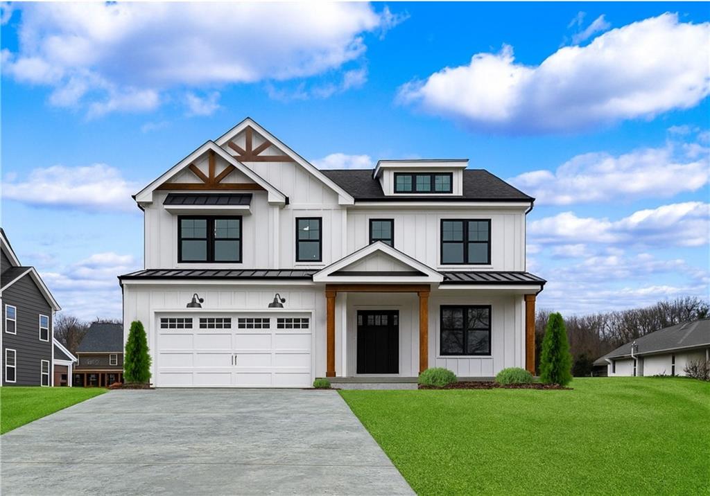 291 McMurray Road Pittsburgh, PA 15241 - Photo 1 of 17 a front view of a house with a yard