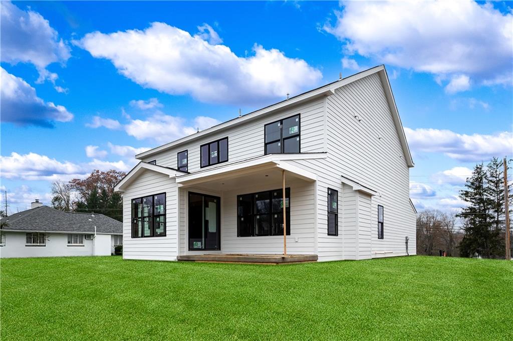 291 McMurray Road Pittsburgh, PA 15241 - Photo 3 of 17 a front view of a house with a garden