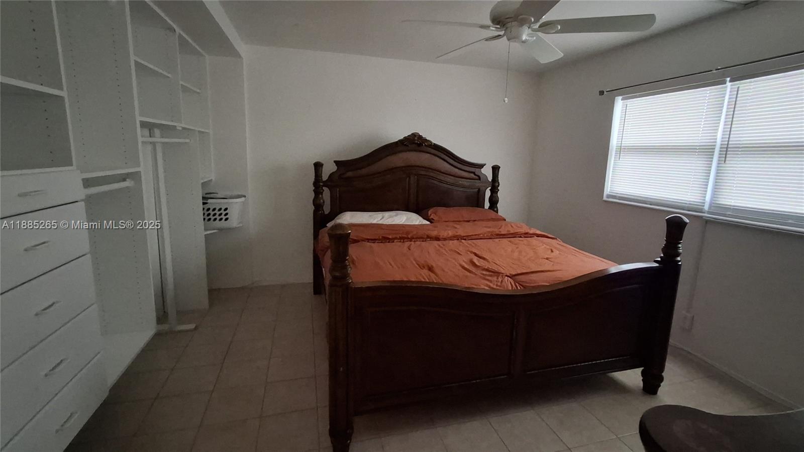 5050 Bayview Drive, Unit 20 Fort Lauderdale, FL 33308 - Photo 5 of 10 a bedroom with a bed and a window