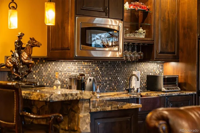 a view of a room with furniture and window