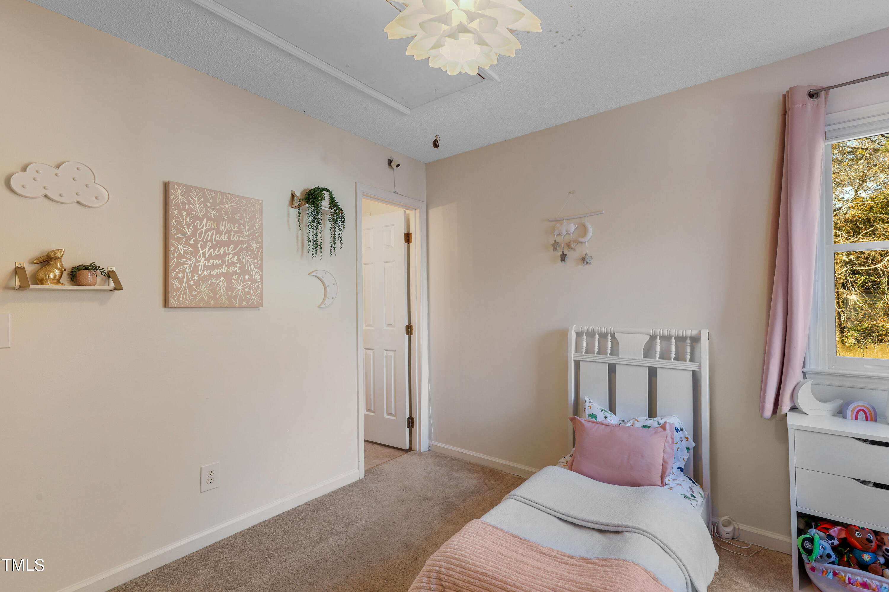 3632 Epperly Court Raleigh, NC 27616 - Photo 16 of 26 a bedroom with a bed and a window