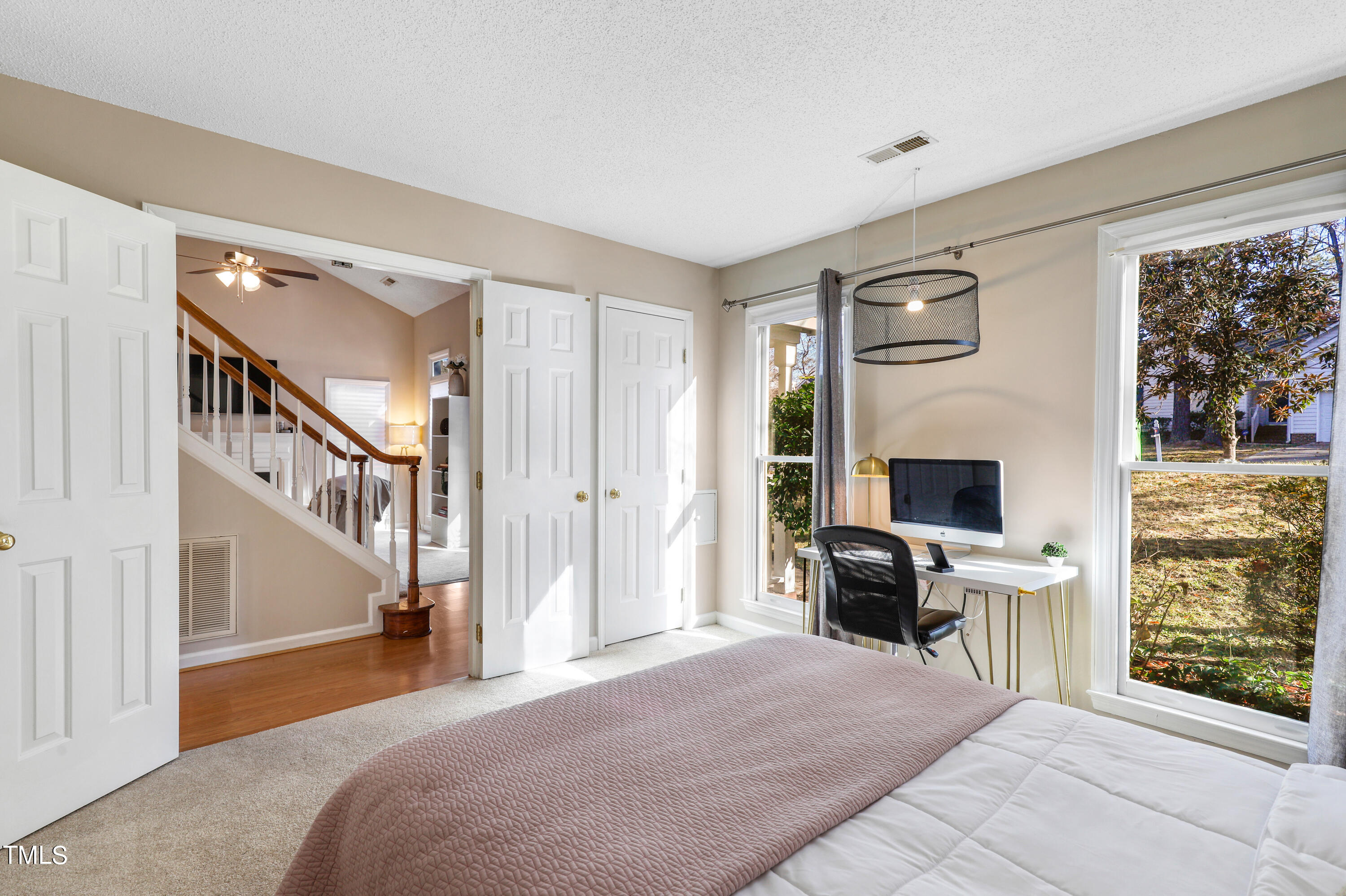 3632 Epperly Court Raleigh, NC 27616 - Photo 19 of 26 a bedroom with furniture and a window