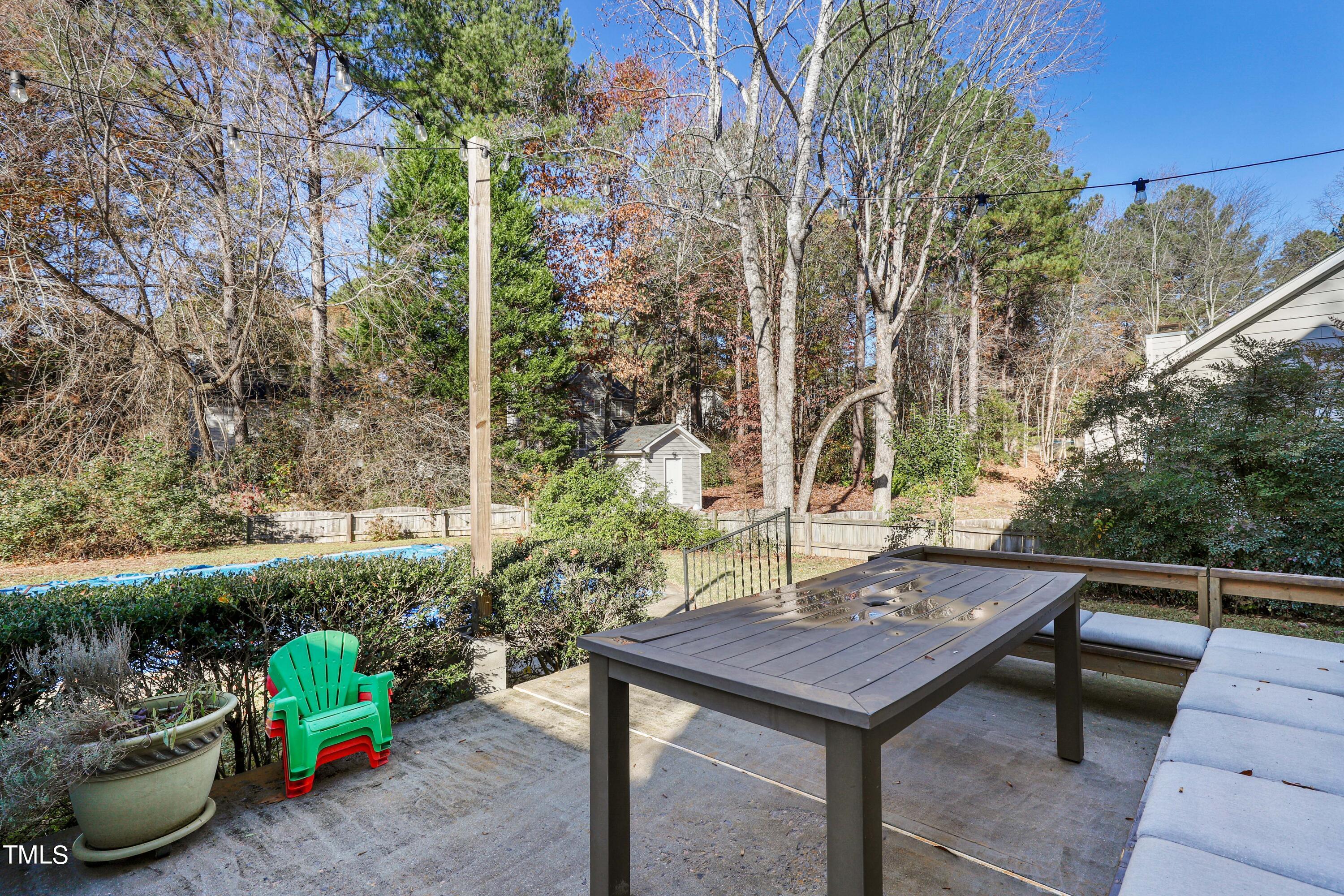 3632 Epperly Court Raleigh, NC 27616 - Photo 24 of 26 a view of a backyard with furniture and plants