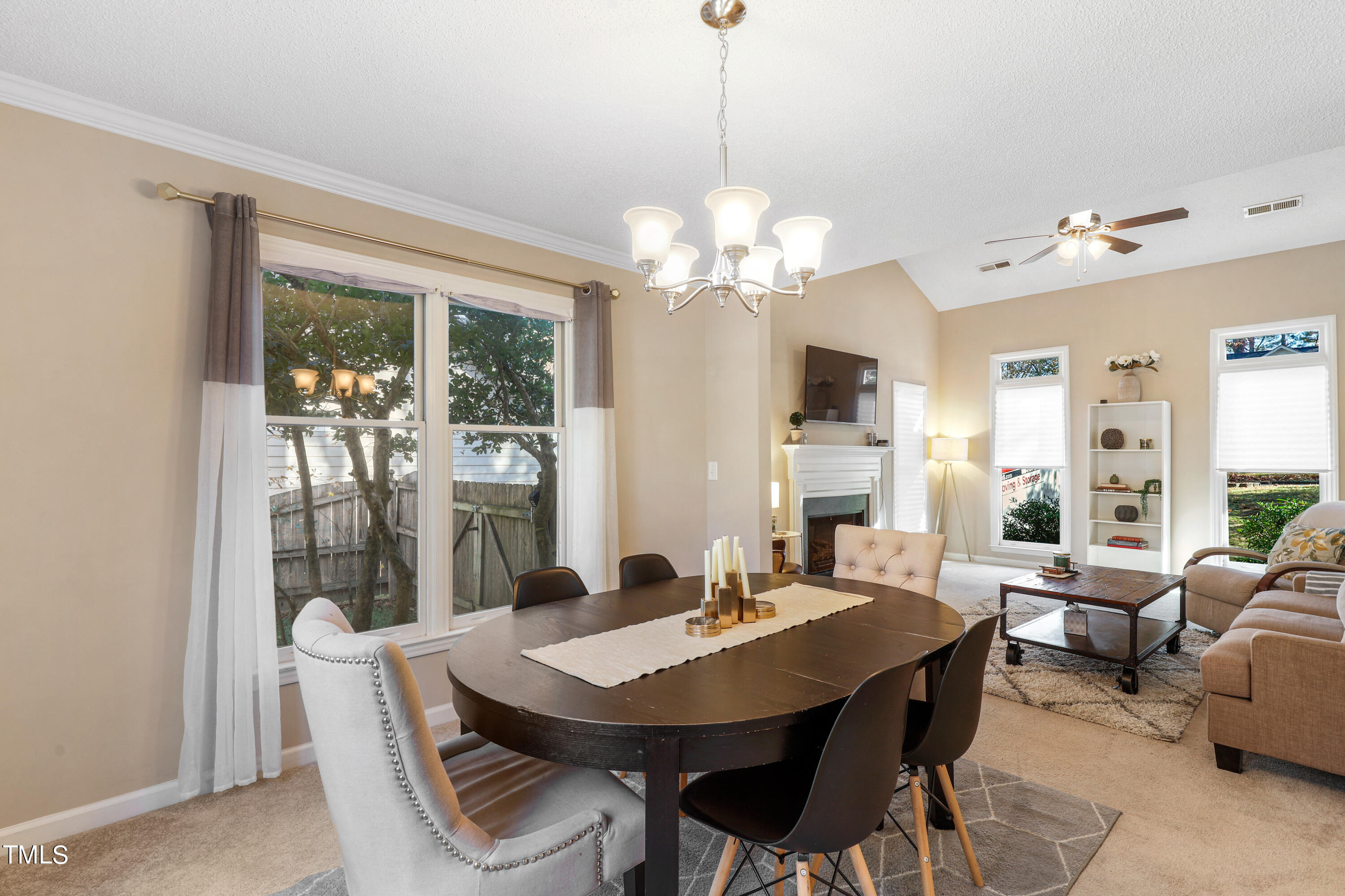 3632 Epperly Court Raleigh, NC 27616 - Photo 5 of 26 a view of a dining room with furniture window and outside view