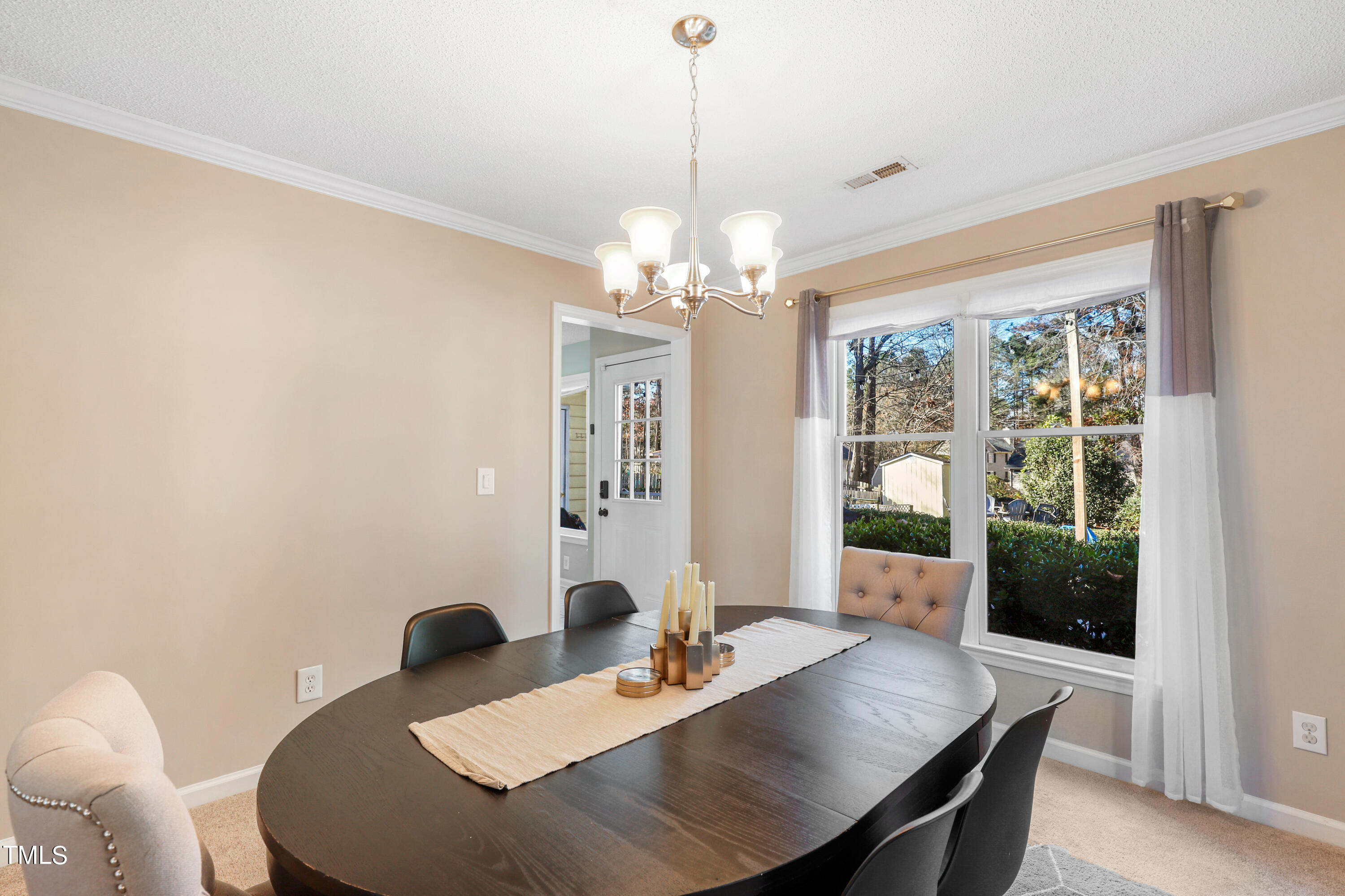 3632 Epperly Court Raleigh, NC 27616 - Photo 6 of 26 a view of a dining room with furniture and window